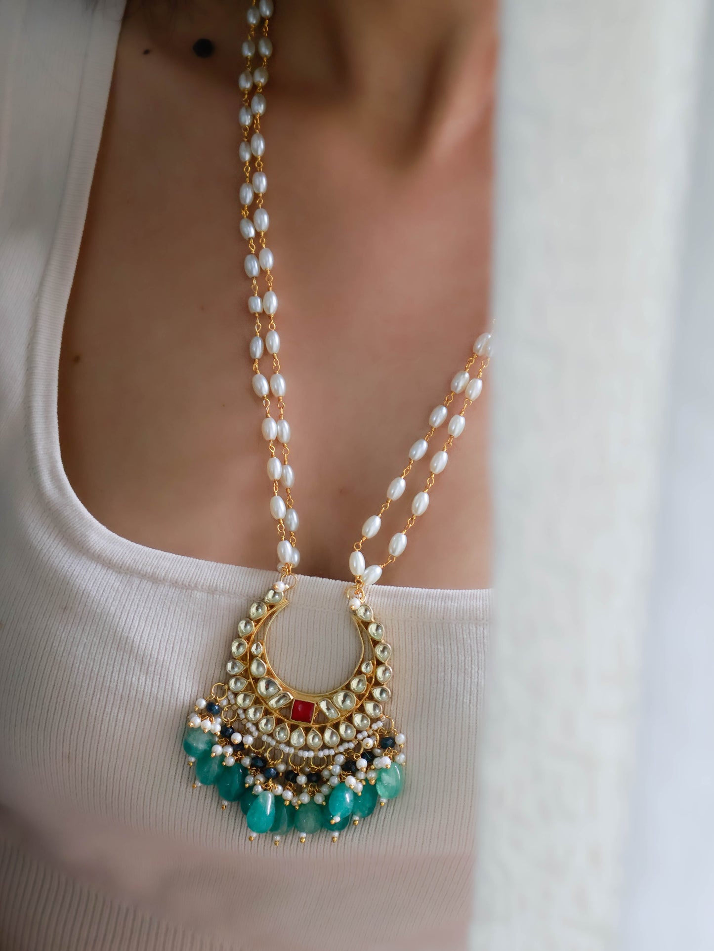 Ozel Red-Green Kundan Pendant Necklace