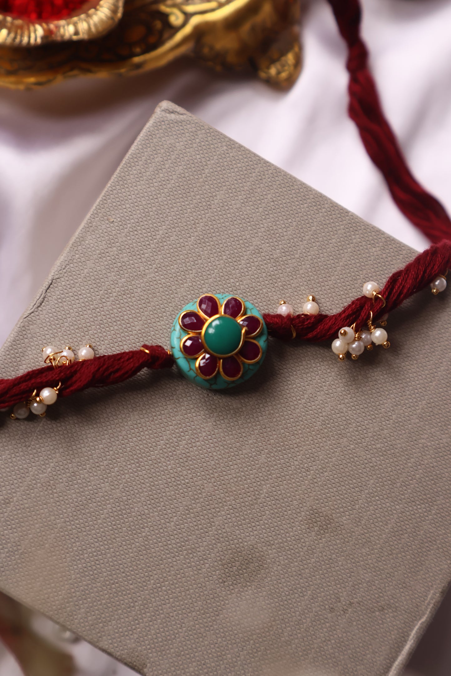 Jheel Turquoise Kundan Rakhi