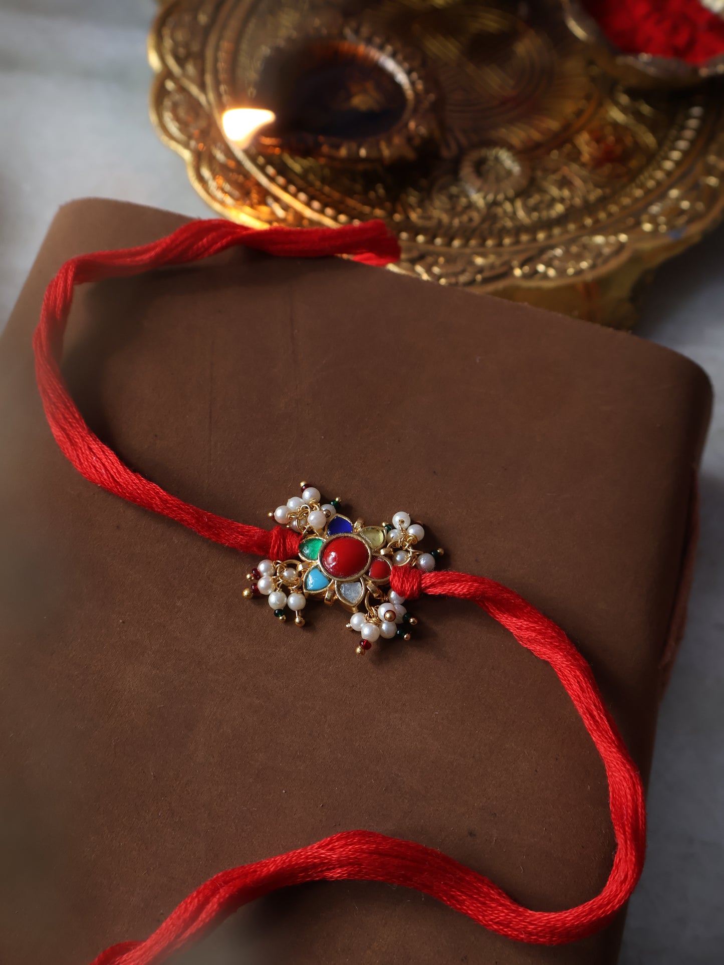 Nav Multicolored Kundan Rakhi