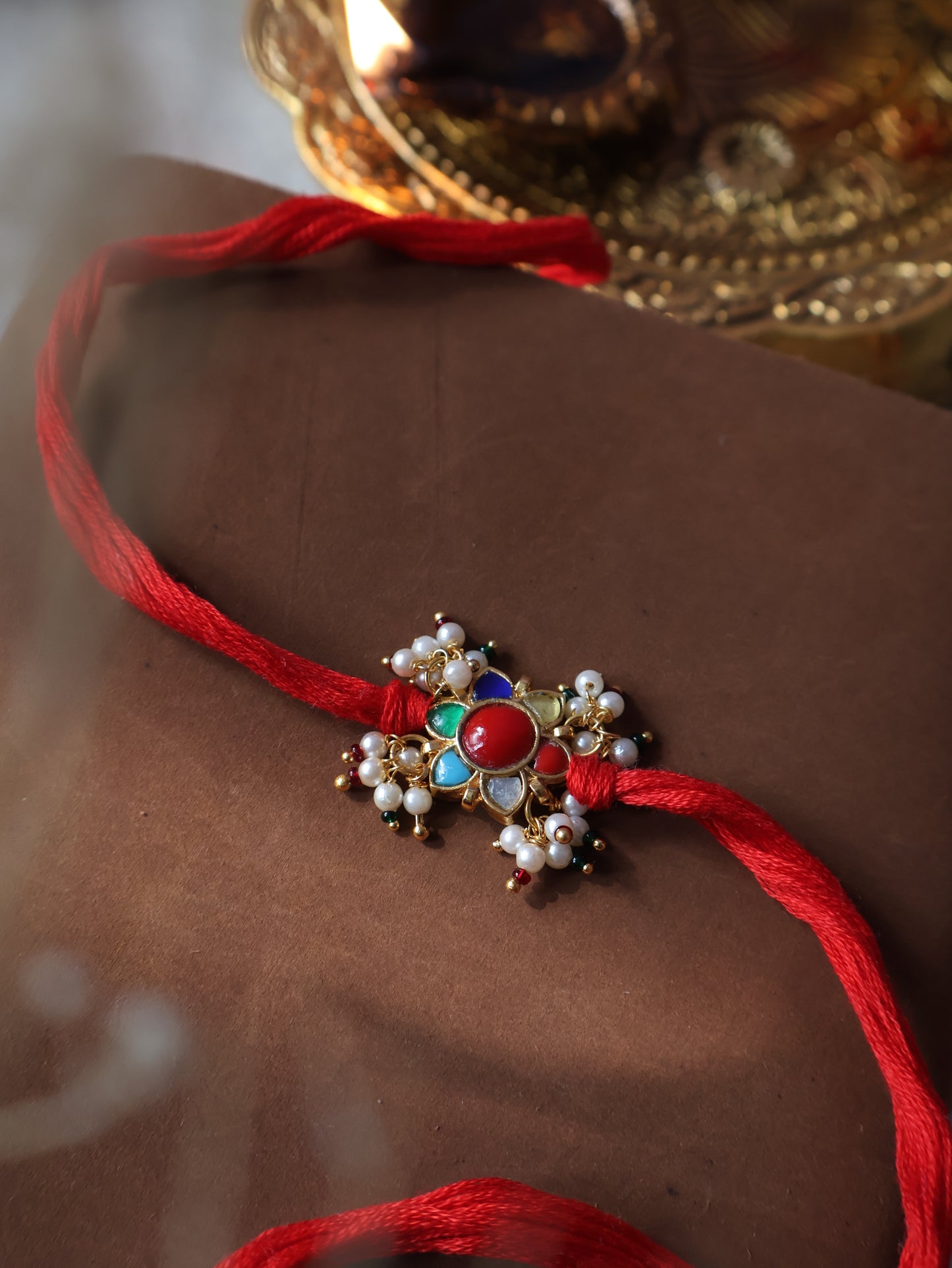 Nav Multicolored Kundan Rakhi