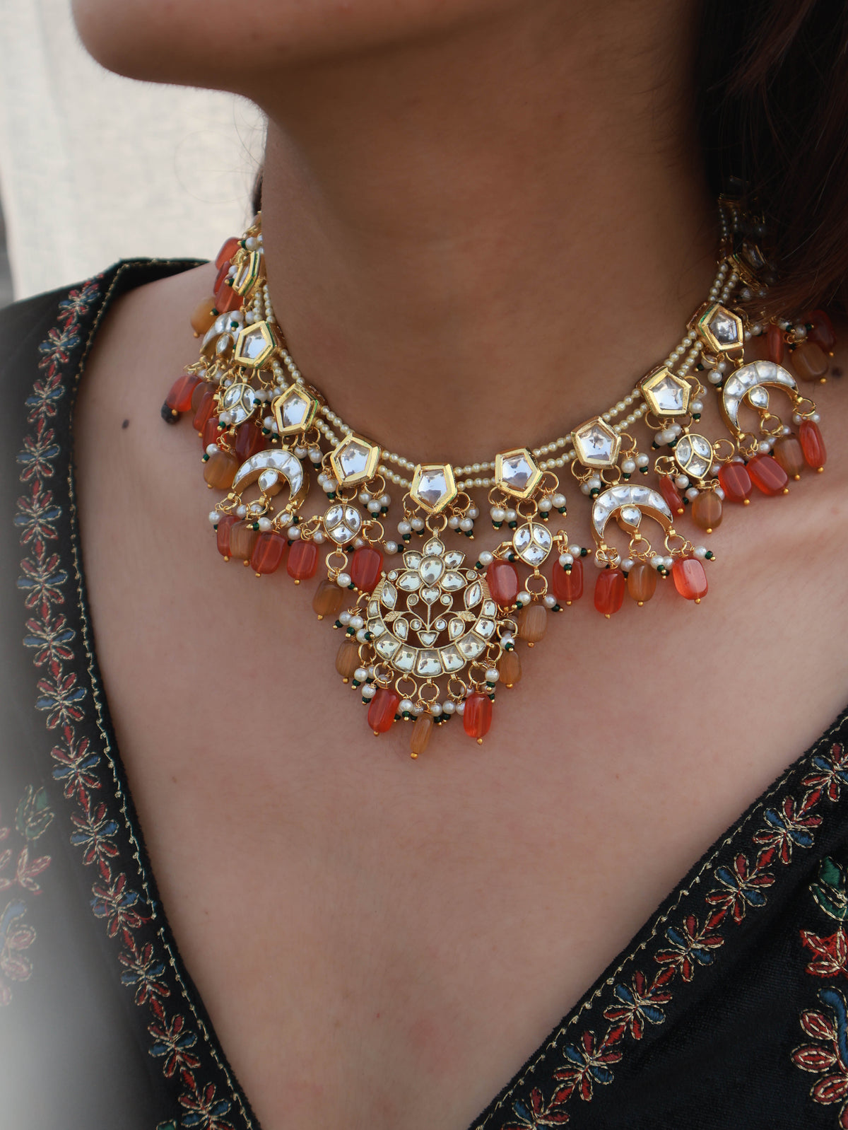 Sarika Orange Kundan Necklace