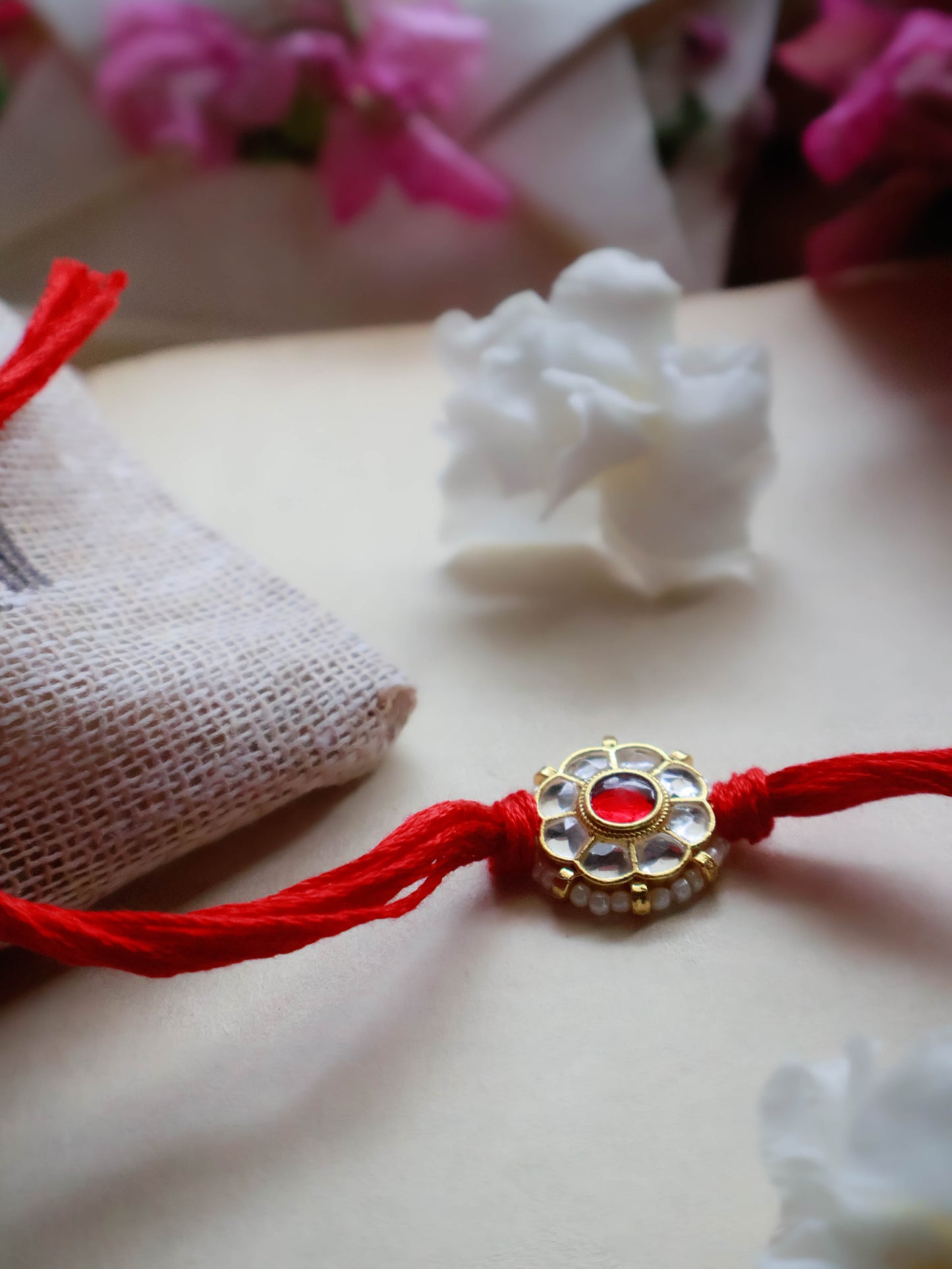 Jatin Red Kundan Floral Rakhi