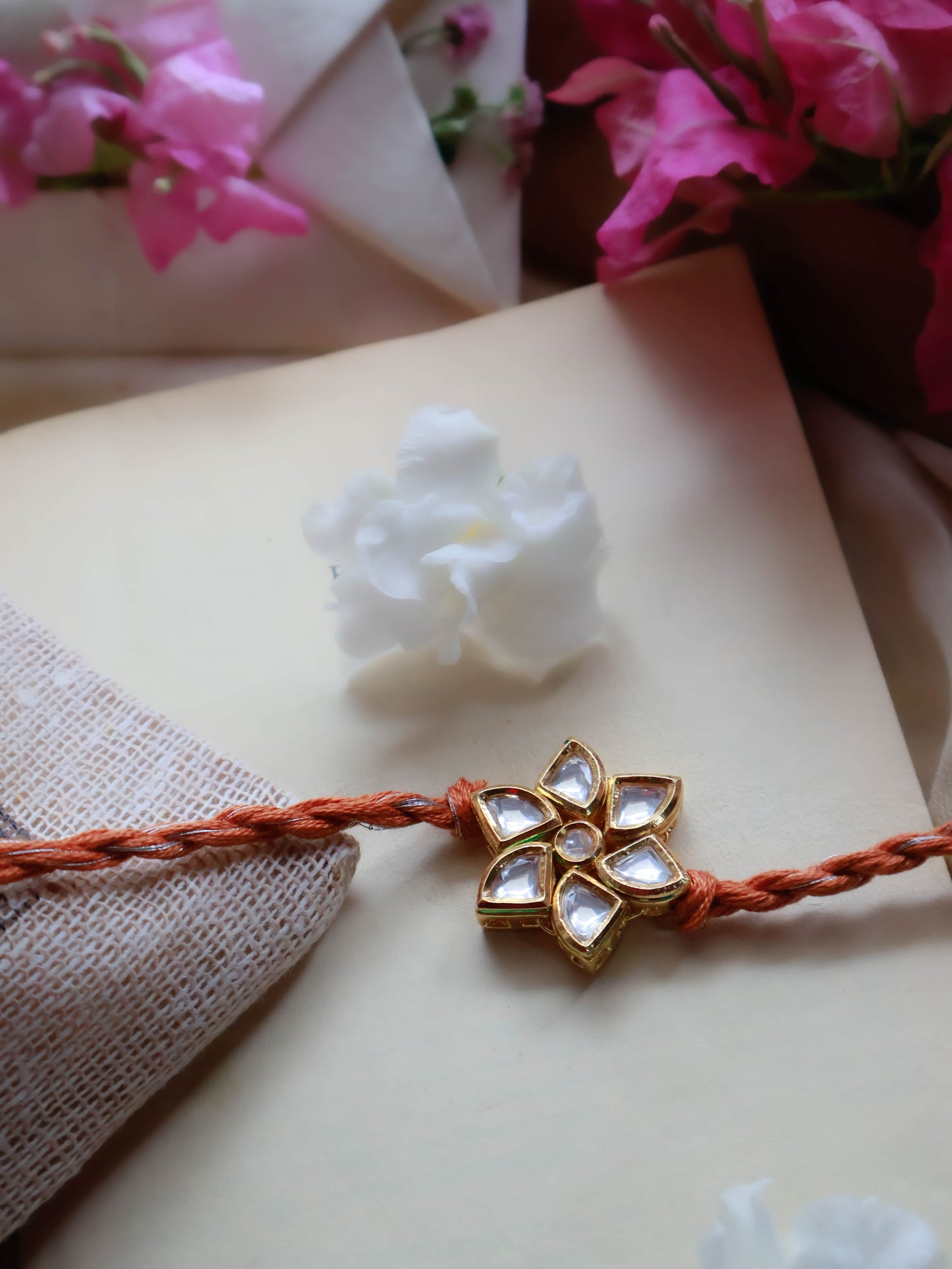 Kavya Floral Kudan Rust Rakhi