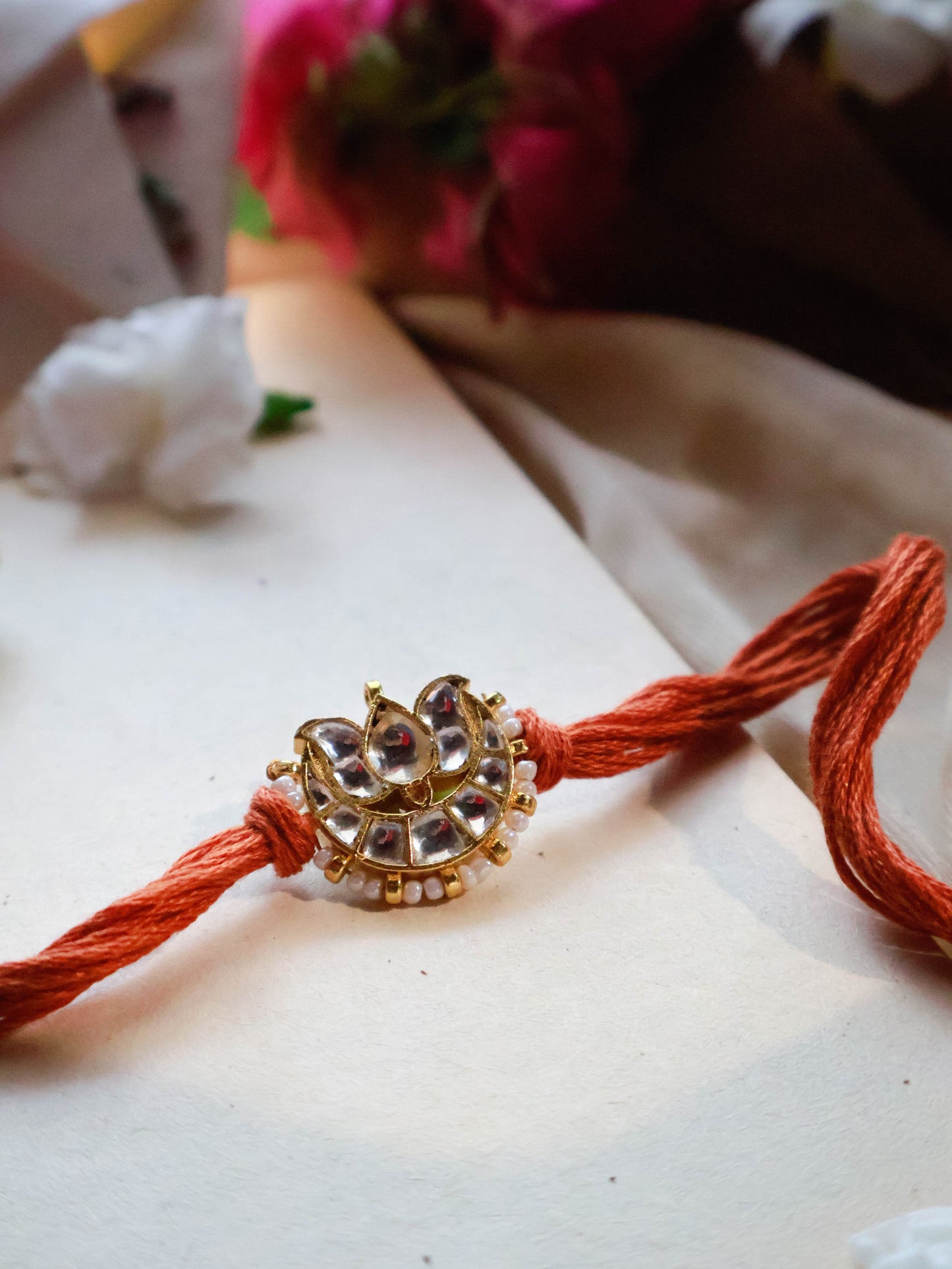 Bheem Lotus Rust Kundan Rakhi