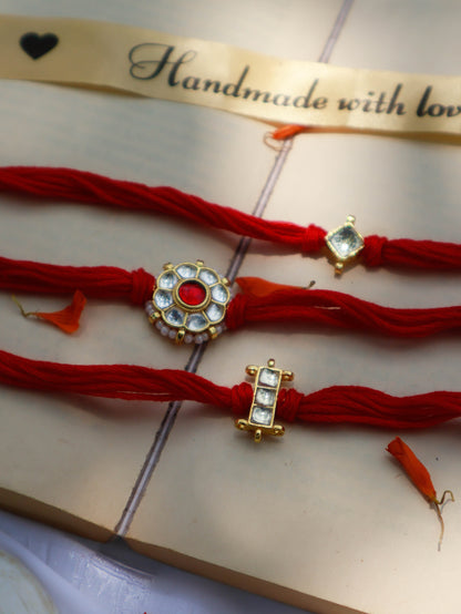 Arihan Red Kundan Rakhi - Set of 3