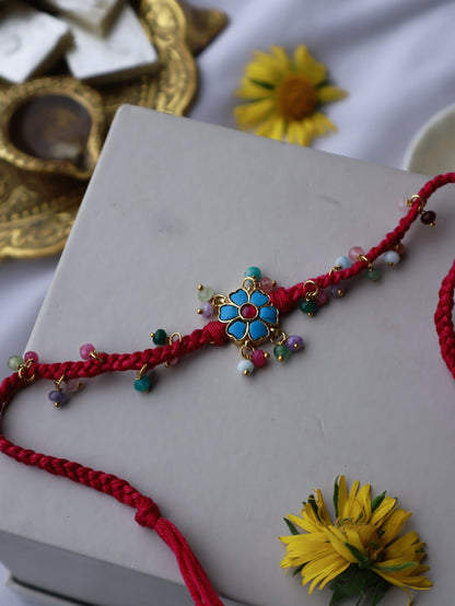 Debashree Turquoise Floral Rakhi