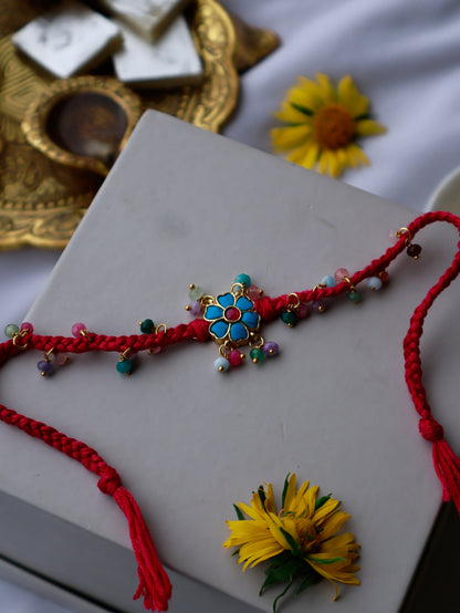Debashree Turquoise Floral Rakhi