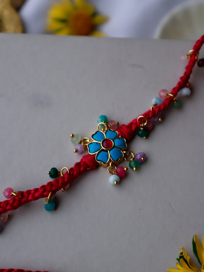 Debashree Turquoise Floral Rakhi
