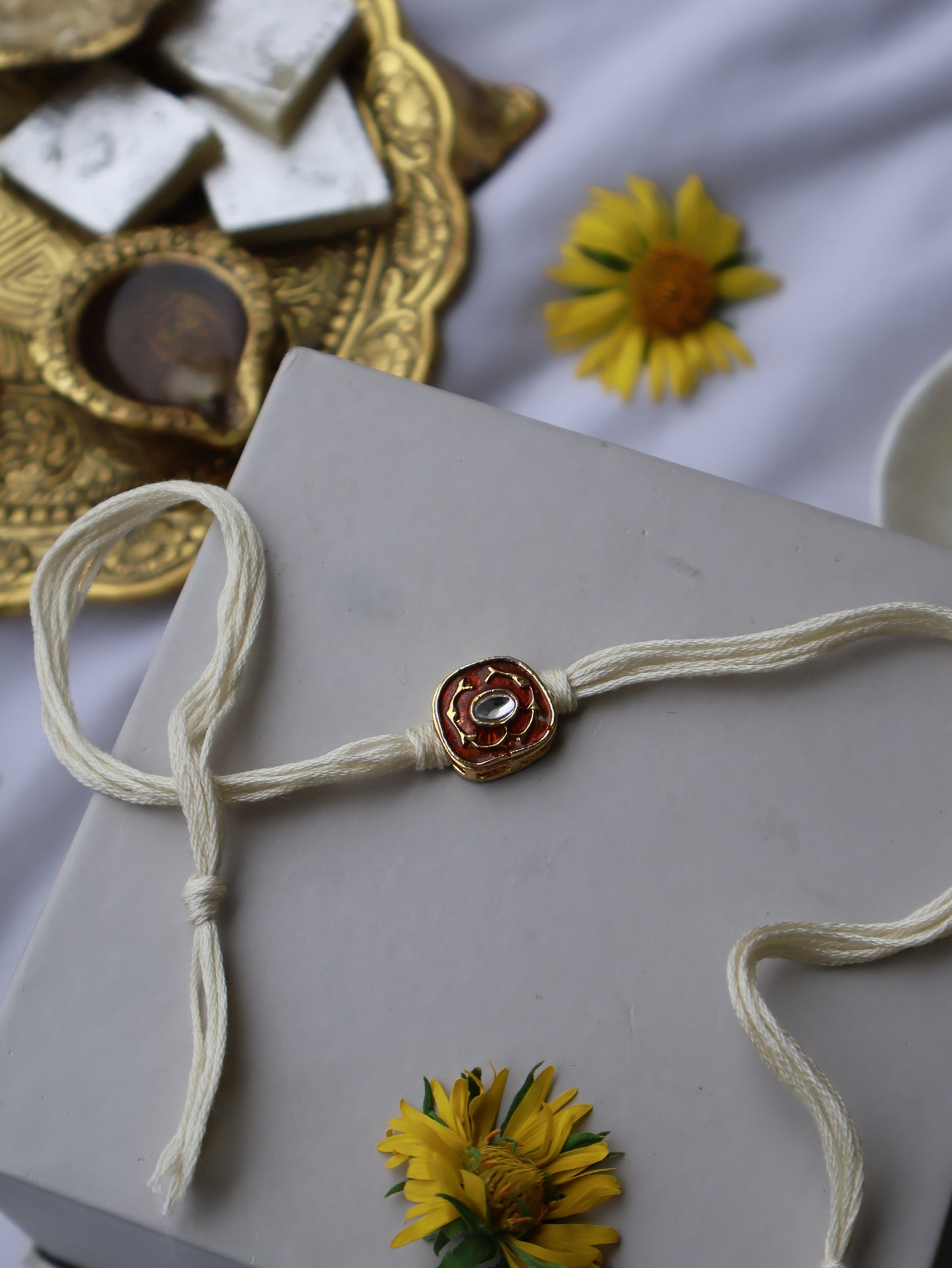Shwet Orange Kundan Rakhi